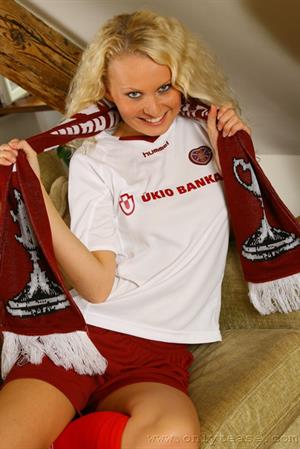  Karen stripping out of a Hearts football kit 