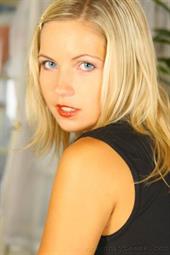  Jenni P strips out of her sexy secretary outfit and naughty black pantyhose 