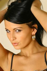  Stunning raven haired Milli in satin lingerie and stockings 