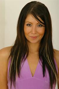  Dark haired Antonia in secretary set with black opaque stockings 