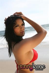 Sunny Leone wearing a red bikini