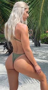 Emma Hartley look super sexy in a green bikini