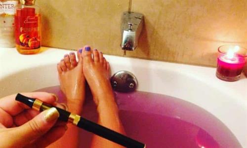 Alexandria Ocasio-Cortez Pictures Alexandria Ocasio-Cortez also known as AOC sexy photo collection showing off her boobs in tight tops and legs nude in the bath.