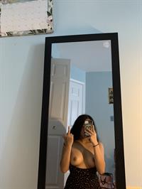 Alona Bloom taking a selfie and - breasts