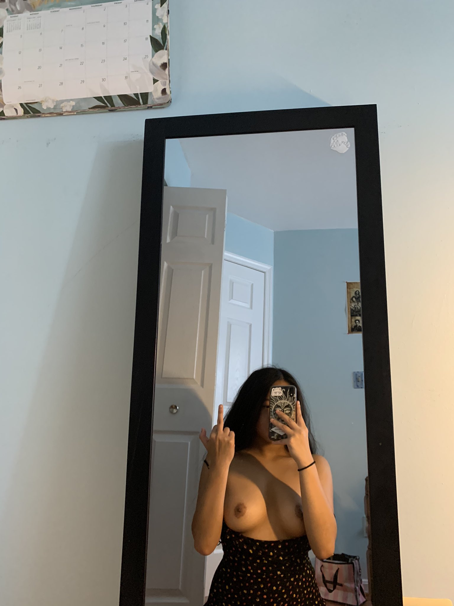 Alona Bloom taking a selfie and - breasts