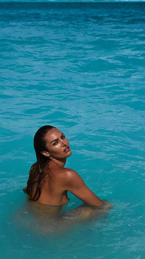 Candice Swanepoel nude boobs new photos in the ocean showing off her topless tits posing naked.