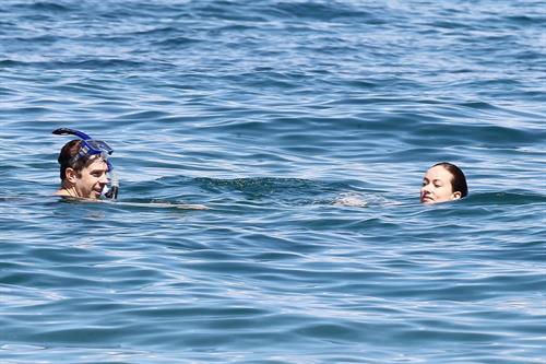 Olivia Wilde Bikini Pictures Olivia Wilde on the beach and in the water in Hawaii - May 26, 2013