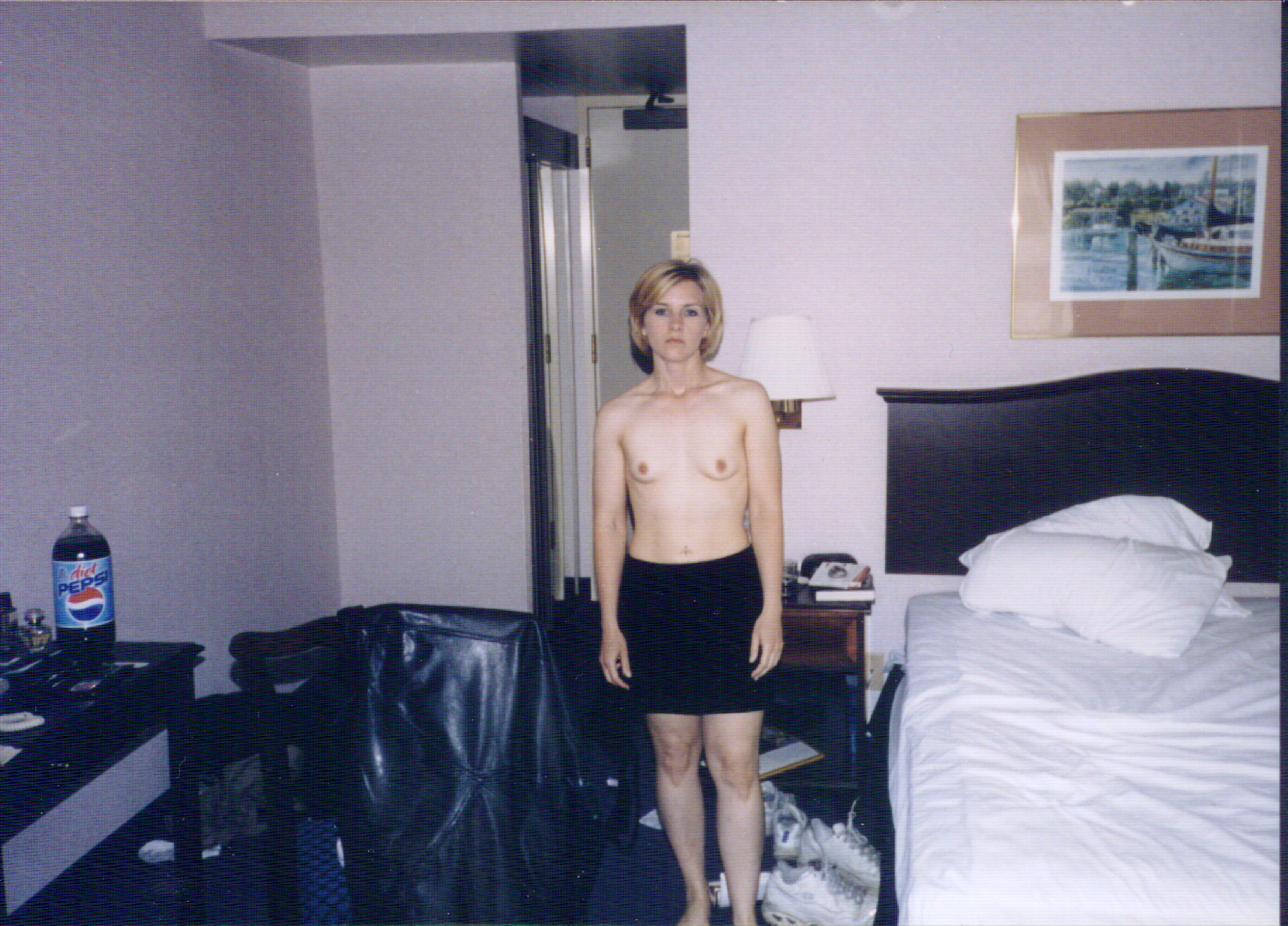 Anonymous taking a selfie and - breasts