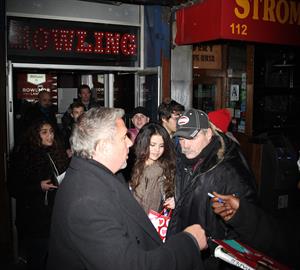 Selena Gomez surrounded by fans for autographs in New York City on February 5, 2013
