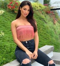 Ripped Black Jeans and Fringe Halter Top