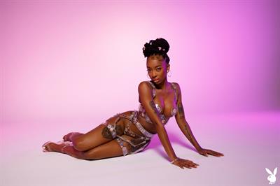 Sabrea Phenix flirty ebony in the studio for Playboy