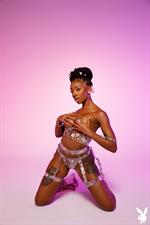 Sabrea Phenix flirty ebony in the studio for Playboy