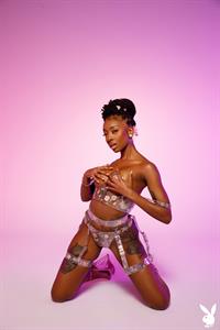 Sabrea Phenix flirty ebony in the studio for Playboy