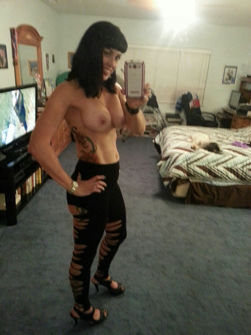 Anonymous taking a selfie and - breasts