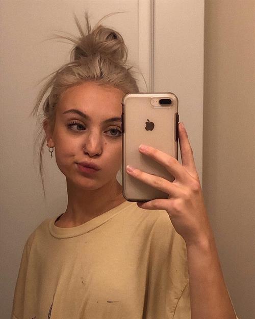 Riley Hubatka taking a selfie