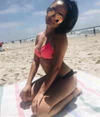 Bianca Cardenas in a bikini taking a selfie