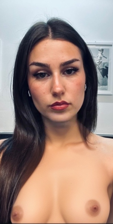 Rubina taking a selfie and - breasts