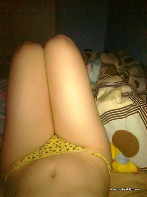 Anonymous in lingerie taking a selfie