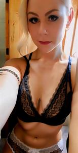 Anonymous in lingerie taking a selfie