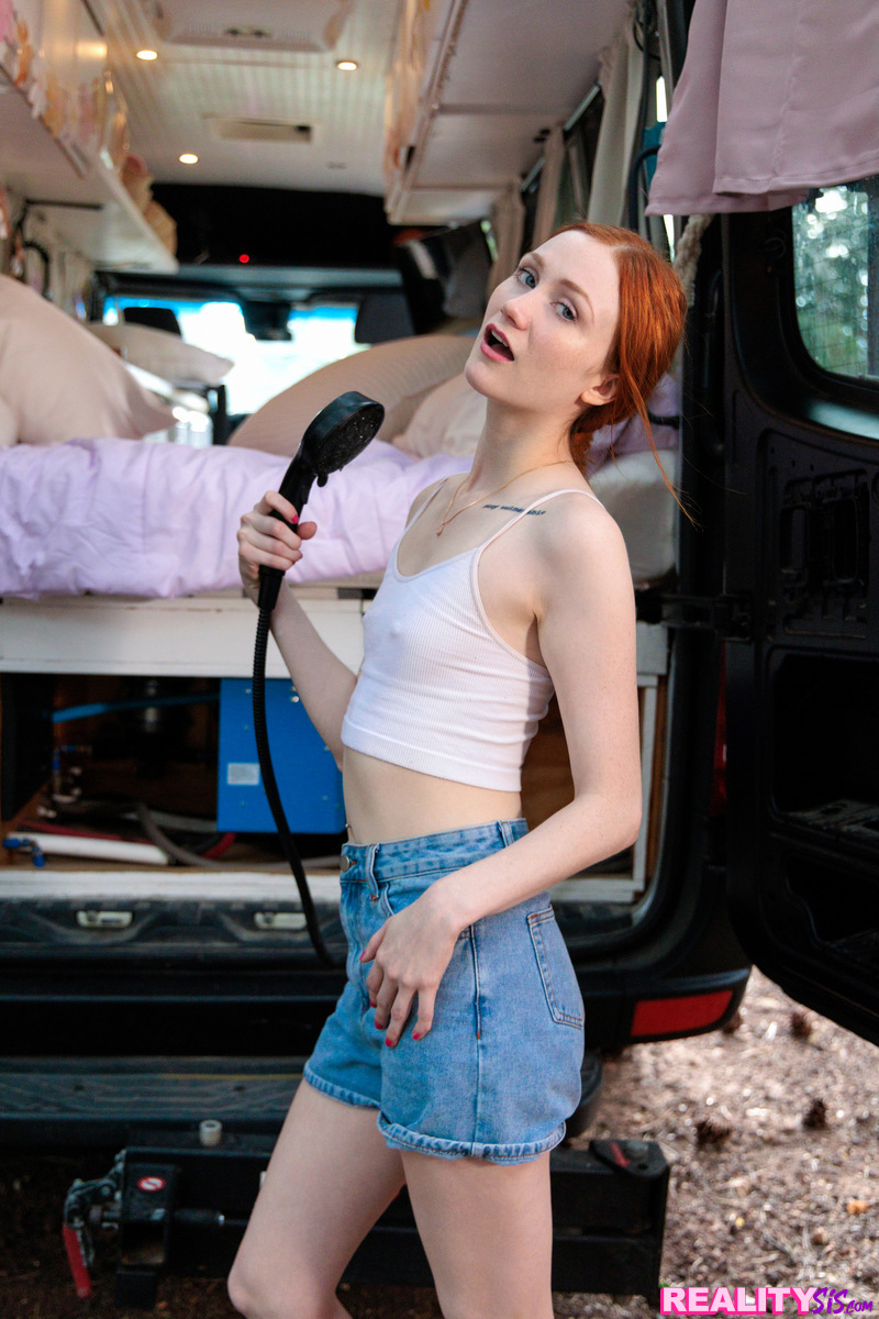 Exhibitionist redhead Scarlet Skies shows us her new van and then how she fucks her stepbrother on the bed inside