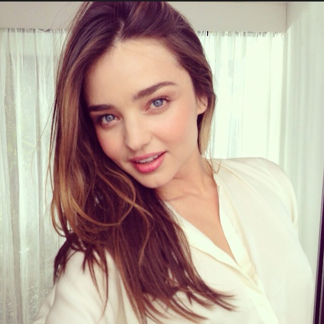 Miranda Kerr taking a selfie
