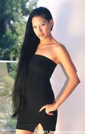 Long haired brunette girl poses & sucks cock