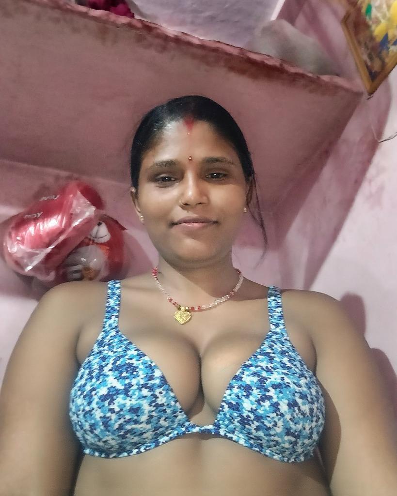 Sexy girl in a bikini taking a selfie