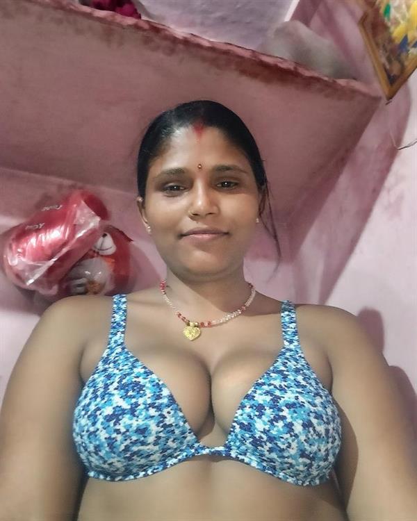 Sexy girl in a bikini taking a selfie