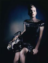 Milla Jovovich in a bikini