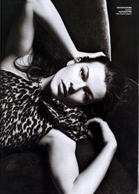 Milla Jovovich in a bikini