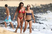 Alex Morgan and Sydney Leroux in bikinis on the beach in Hawaii